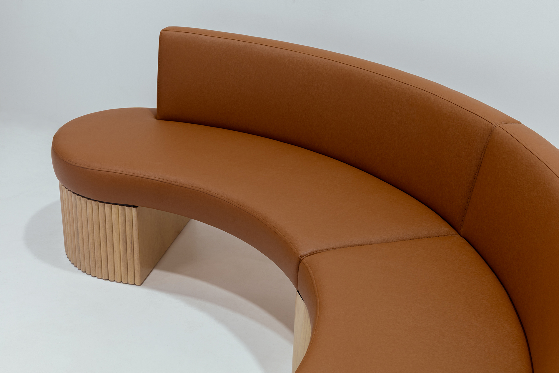 commercial curved sofa floating tambour fluted leg base